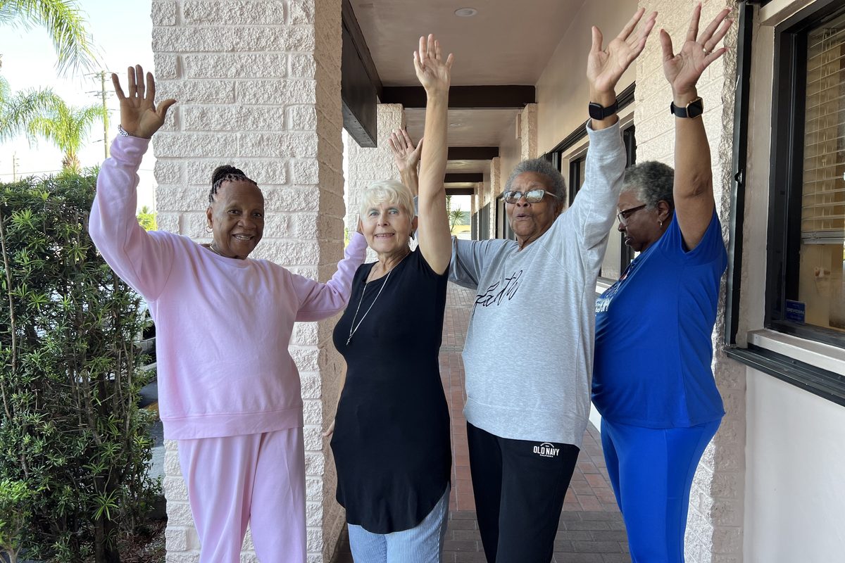 Senior Friendly Fitness members celebrating community and movement together.